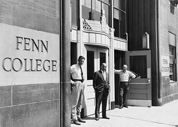 Phillip Forniti,Nicholas Rimboi, and Prof. Kenneth Sherman in front of Fenn Tower's main entrance, 1959.