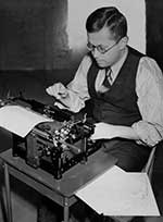 Theodore Andrica at his typewriter