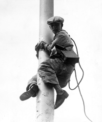 Fred Bottomer climbing the Terminal Tower Flagpole, 1927
