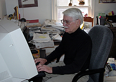Roldo on computer at his desk