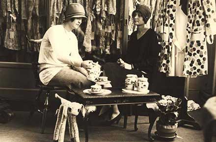 Two ladies drinking tea at Sterling-Lindner-Davis department store, 1928.