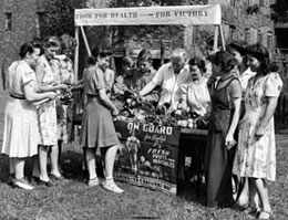 Surplus produce sale in Cedar housing project victory garden